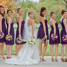 Columbus wedding featuring custom floral arrangements, with the bride and bridesmaids holding their beautiful bouquets