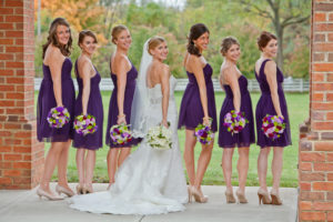 Columbus wedding featuring custom floral arrangements, with the bride and bridesmaids holding their beautiful bouquets