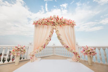 Blush flowers for outdoor wedding arch