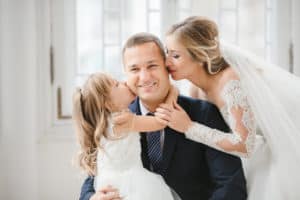 Bride and groom with daighter. 