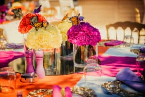 Colorful rose centerpieces with butterflies