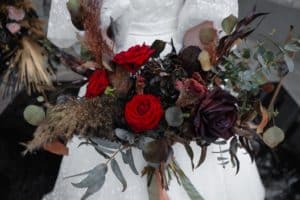 Wedding bouquet of black dried flowers. Wedding decor.