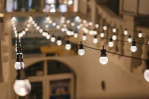 light bulbs garland. cafe exterior decor. closeup rows of lamps 