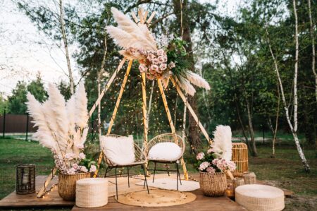 wedding ceremony area in boho style with dried flowers. outdoor wedding