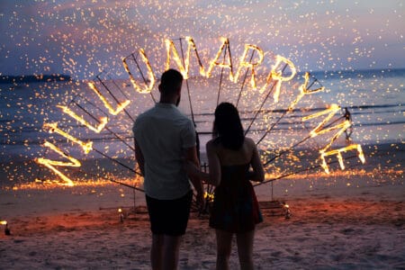 surprise proposal marry me to wedding fireworks, sparklers, beach sunset